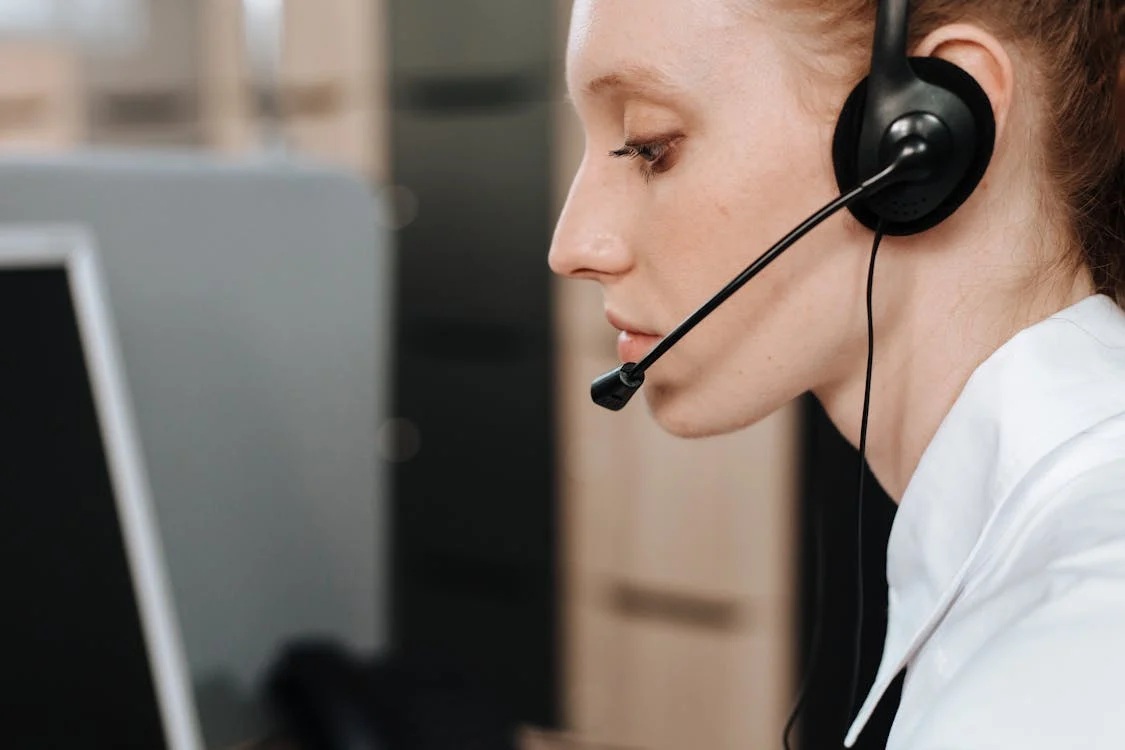 professional woman wearing a headset